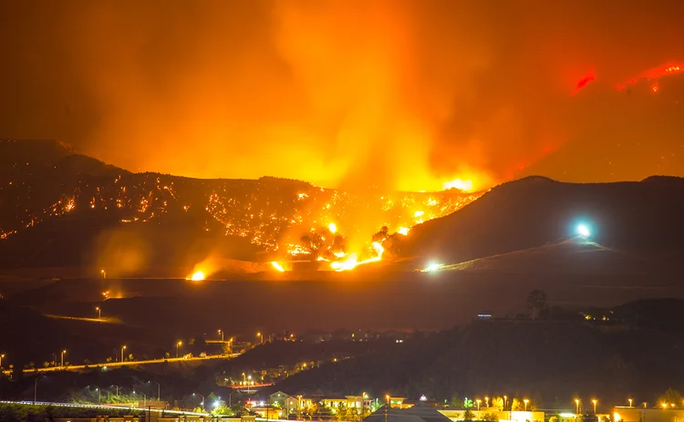 Night long exposure photograph of the Santa Clarita wildfire in CA. The Santa Clarita Valley mountains has drawn firefighters and emergency crews in the hills toward Acton. So far, the fire has burned 38,346 acres.